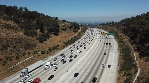 Aerial Drone View of 405  freeway looking at the San Fernando Valley Stock Footage 93428776