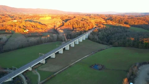 Aerial drone view 4K High speed storm bird railbridge Tuscany Valdarno Italy Stock Footage 191193889