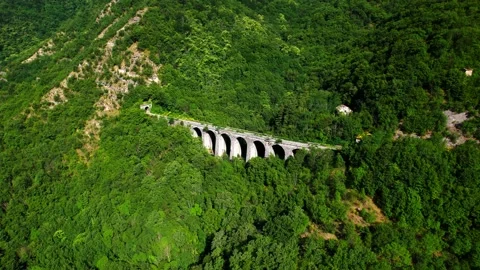 Aerial drone view 4k orbit Valdicampi Rail Bridge Tuscany Italy Stock Footage 197562857