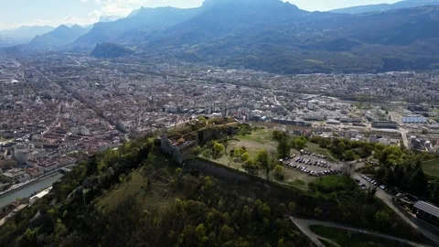 Aerial drone view from above Fort de La Bastille on the panorama of Grenoble Stock Footage 240605953