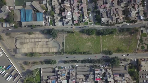 Aerial drone view from above moving away from a bmx circuit Los Precursores Stock Footage 157814191