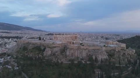 Aerial drone view of the Acropolis and Parthenon at dusk Athens Greece Stock Footage 345679798