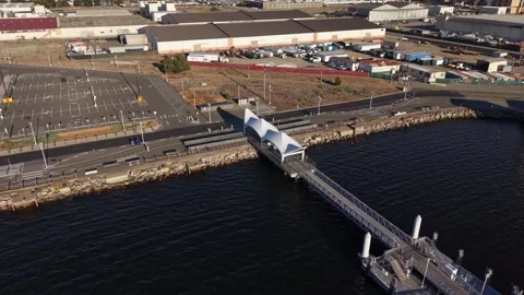 Aerial drone view of Alameda Ferry Point in California Видео 345009100