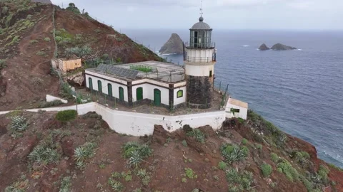 Aerial Drone View of Anaga Lighthouse on the Rugged Atlantic Coast of Tenerife 스톡 동영상 344711725