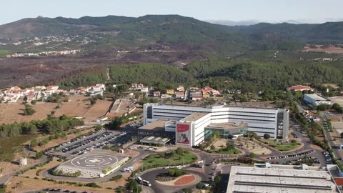 Aerial drone view approaching Cascais Hospital in Alcabideche, Cascais, Portugal Stock Footage 248709220