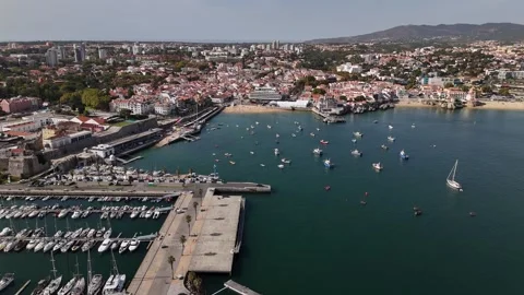 Aerial drone view approaching Cascais, Portugal on a sunny day Stock Footage 319136143