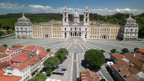 Aerial drone view approaching Convent of Mafra and lovely village houses Stock Footage 276192388
