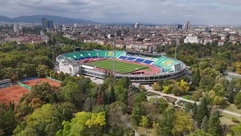 Aerial drone view approaching empty Vasil Levski National stadium in Sofia Stock Footage 318967998