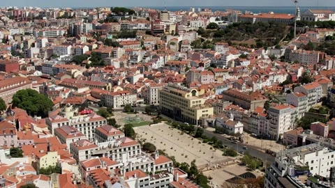 Aerial drone view approaching Martim Moniz neighbourhood in central Lisbon Stock Footage 207713358