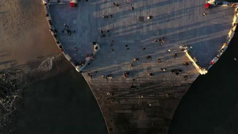 Aerial drone view of the Augusta Street Arch from Commerce Square in Lisbon, Stock Footage