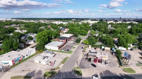 Aerial Drone View of Austin Texas Suburban Neighborhood and Downtown Skyline Stock Footage 338360078