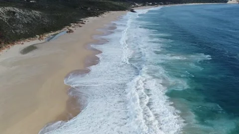 Aerial drone view of Australian beach with crashing waves and stunning coastline Stock-Footage 302576134