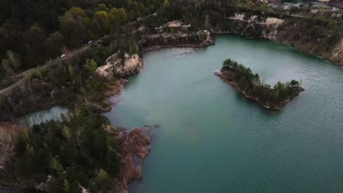 Aerial drone view Basalt columns on Emerald lake in a flooded quarry Stock Footage 177866432