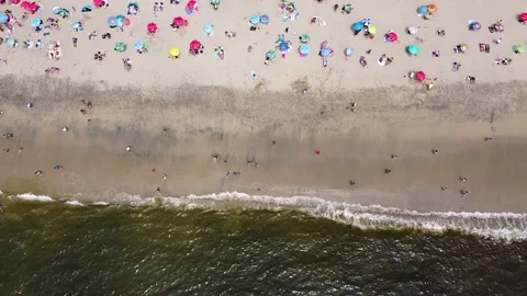Aerial drone view of beach with crowd of people Stock Footage 149133502