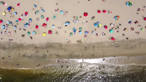 Aerial drone view of beach with crowd of people Stock Footage 149133526