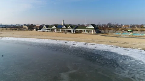 Aerial drone view beach hut seagulls Long Island NY Stock Footage 102532437