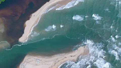 Aerial Drone View of beach town Caraiva Bahia Brazil Top Down Ocean Abstract Stock Footage 239679144