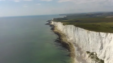 Aerial drone View of Beachy Head white chalk cliffs stretching along rugged Stock Footage 342296512