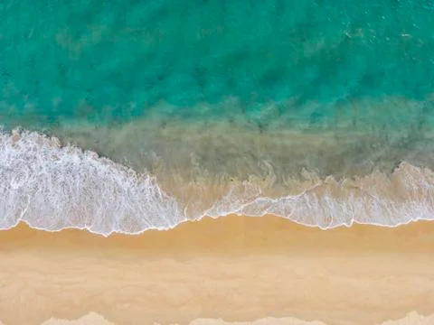 Aerial Drone view beautiful empty beach. Top view wave from sea come to beach Stock Photos