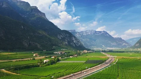 Aerial Drone View: Beautiful Farmlands of Italy Located in Mountains. Highway Stock Footage