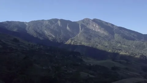 Aerial drone view of beautiful mountain landscape, valley village houses. 4K Stock Footage 153279197