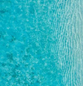 Aerial Drone View of Beautiful Summer Seascape with Blue Ocean Waves Stock Photos