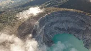 Aerial Drone View Of Beautiful Volcanic Landscape And Acid Lake With Clouds N Stock Footage