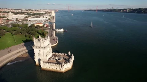 Aerial drone view of Belem Tower overlooking the Tagus River in Lisbon Stock Footage 221272059