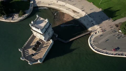 Aerial drone view of Belem Tower overlooking the Tagus River in Lisbon Stock Footage 221272110
