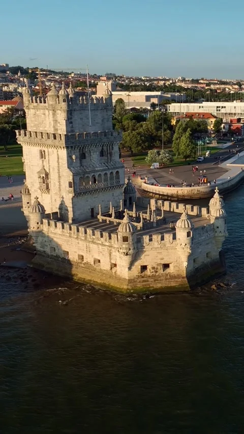 Aerial drone view of Belem Tower on the bank of the Tagus River at sunset. Stock Footage 344583291