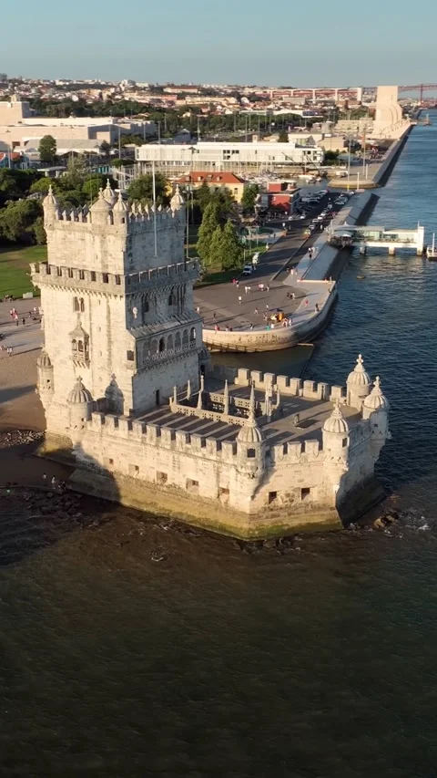 Aerial drone view of Belem Tower on the bank of the Tagus River at sunset. Stock-Footage 344584353