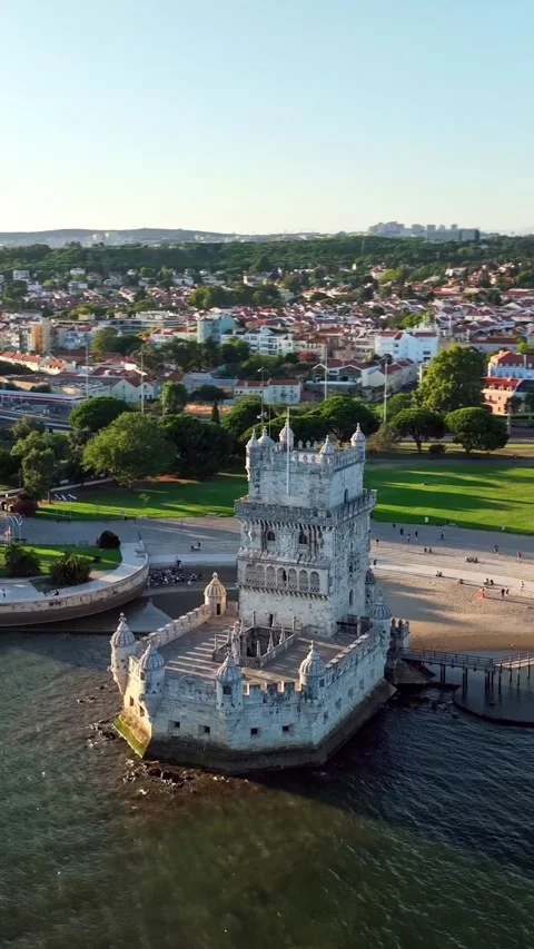Aerial drone view of Belem Tower on the bank of the Tagus River at sunset. Stock-Footage 344584356