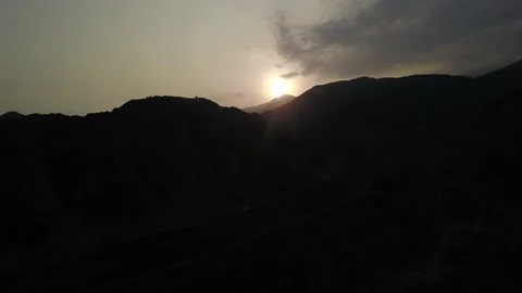 Aerial drone view between mountains over a village in the highlands of Lunahuana Stock Footage 199564255