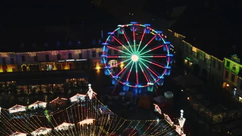 Aerial drone view of The Big Square in Sibiu at night, Romania. Old city centre Stock Footage 168622743