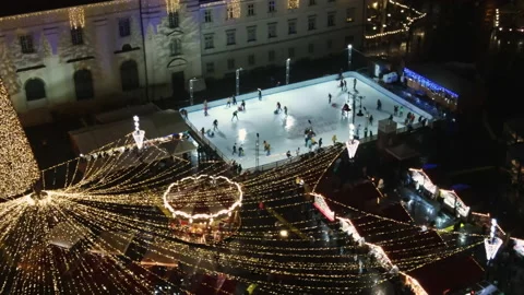 Aerial drone view of The Big Square in Sibiu at night, Romania. Old city centre Stock Footage 168622757