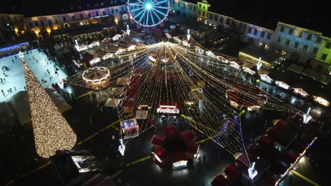 Aerial drone view of The Big Square in Sibiu at night, Romania. Old city centre Stock Footage 168622984