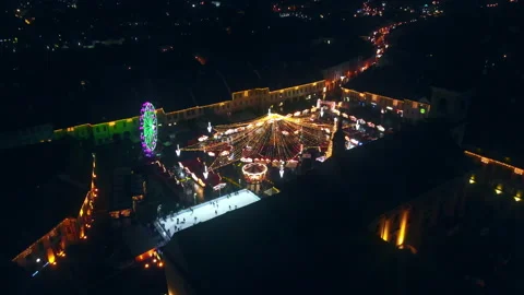 Aerial drone view of The Big Square in Sibiu at night, Romania. Old city centre Stock Footage 168627440