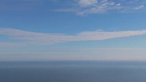 Aerial drone view of blue sky with soft clouds Stock Footage 323528682
