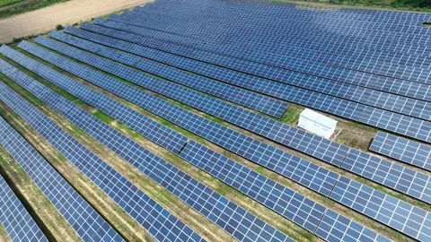 Aerial Drone view of Blue Solar panel farm or solar power plant Stock Footage 252432998