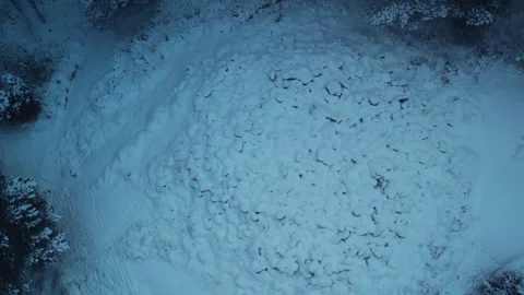 Aerial Drone View of Bronze Age Stone Cairn on Snow Covered Utbyberget in Stock Footage 342235101