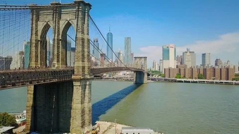 Aerial drone view of Brooklyn Bridge and the Hudson River Stock Footage