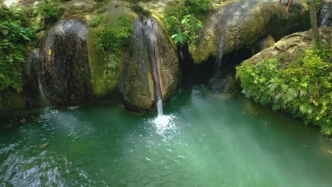 Aerial drone view of Cambugahay falls, Siquijor island, Philippines. Stock Footage 253891453