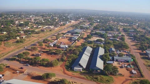 Aerial drone view captures a developing mixed-use area in Molepolole, Botsw.. Stock Footage 327766265