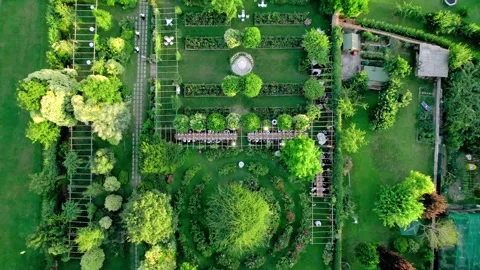 Aerial drone view captures the serene elegance of a summer wedding dinner. Stock Footage 264049657