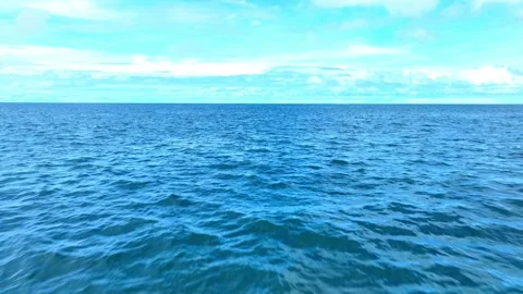 An aerial drone view captures the tranquil beauty of the tropical sea. Stock Footage 307939214