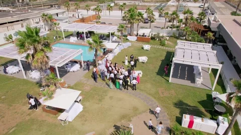 Aerial drone view captures the vibrant evening atmosphere of a Mediterranean. Stock Footage 265843448