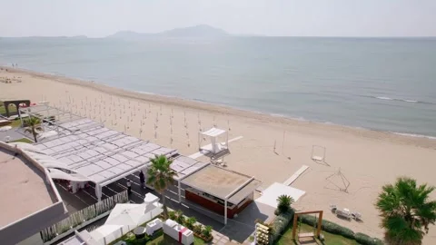 Aerial drone view captures the vibrant evening atmosphere of a Mediterranean. Stock Footage 265843750