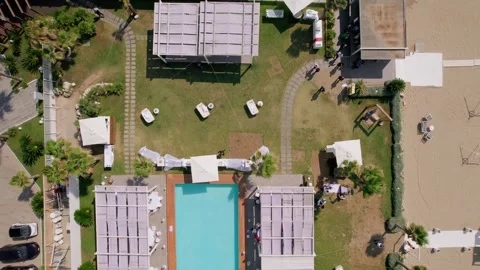 Aerial drone view captures the vibrant evening atmosphere of a Mediterranean. Stock Footage 265843872