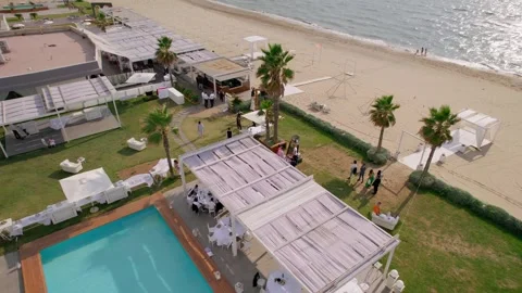 Aerial drone view captures the vibrant evening atmosphere of a Mediterranean. Stock Footage 265844077
