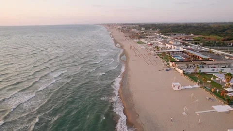 Aerial drone view captures the vibrant evening atmosphere of a Mediterranean. Stock Footage 265844153